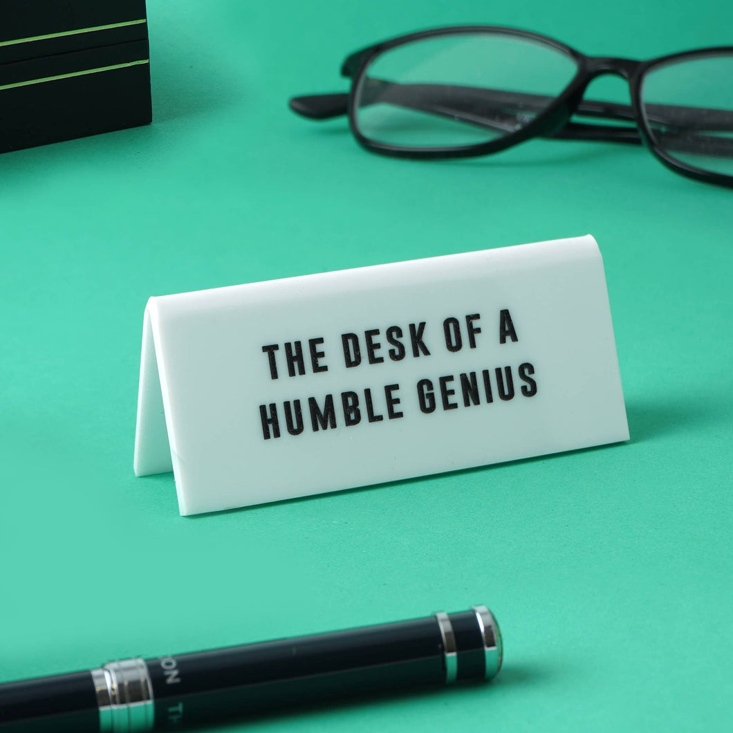 'The Desk Of A Humble Genius' White Desk Sign